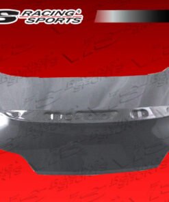 2008-2013 Infiniti G37 2Dr Oem Style Carbon Fiber Trunk. VIS Carbon Fiber Trunks are made from 100% ISO-certified, Grade-A carbon fiber material.  All VIS Carbon Fiber Trunks are manufactured using a two-part construction design.  The top layer is composed of carbon fiber material bonded to the trunk surface with high-grade epoxy resin, andfinished with an ultra-clear (Poly Shield), UV-protective polyurethane coating for a high gloss finish.  A one-piece, smooth underside shell is fused to the top layer enhancing the product’s structural integrity.  The edges are smoothed by hands to insure good quality finish all around. In 2014, we further improved on this manufacturing process by introducing the Vacuum Infusion Process (V.I.P.), which utilizes a single-mold vacuum to produce parts that are 10-20% lighter than before while improving durability. We are transitioning our full spectrum of carbon parts to use the VIP process so that our customers can enjoy these improved products without incurring a huge cost increase.
All VIS Carbon Fiber Hoods and Trunks come with a VIS badge of authenticity. Please be sure to look for the badge when purchasing. Due to the unknown nature of the intended uses of these products, hood pins are required. These products are intended for off-road use only, unless your local and state laws state otherwise.