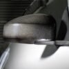Add an exotic, race-inspired look to your vehicle without having to spend exotic money.  Featuring wide-angled, anti-glare lenses, these Carbon Fiber Mirror Covers w/ Lenses attach directly to your vehicle's factory mirrors quickly and easily.  No permanent modifications are necessary.Sold as a set - includes coverage of driver & passenger sides for one (1) vehicle.Features:Pre-preg. Carbon Fiber Manufacturing Process
Mirror Covers are vacuum-bagged and cured in the autoclave at high temperatures, ensuring quality, durability, and extremely-high strengh-to-weight ratios.
Fade-Resistant Clear Coat
Mirror Covers are finished with UV-stable, production clear coat paint, then individually hand-polished to a brilliant shine.
Easy Installation
Mirrors / Mirror Covers are designed to factory specifications for easy installation and clean fit and finish.