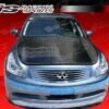 2009-2012 Infiniti G37 4Dr Oem Style Carbon Fiber Hood. VIS Carbon Fiber Hoods and Trunks are made from 100% ISO-certified, Grade-A carbon fiber material. All VIS Carbon Fiber Hoods and Trunks are manufactured using a two-part construction design. The top layer is composed of carbon fiber material bonded to the hood surface with high-grade epoxy resin, andfinished with an ultra-clear (Poly Shield), UV-protective polyurethane coating for a high gloss finish. A one-piece, smooth underside shell is fused to the top layer enhancing the product’s structural integrity. The edges are smoothed by hands to insure good quality finish all around. In 2014, we further improved on this manufacturing process by introducing the Vacuum Infusion Process (V.I.P.), which utilizes a single-mold vacuum to produce parts that are 10-20% lighter than before while improving durability. We are transitioning our full spectrum of carbon parts to use the VIP process so that our customers can enjoy these improved products without incurring a huge cost increase.
All VIS Carbon Fiber Hoods and Trunks come with a VIS badge of authenticity. Please be sure to look for the badge when purchasing. Due to the unknown nature of the intended uses of these products, hood pins are required. These products are intended for off-road use only, unless your local and state laws state otherwise.