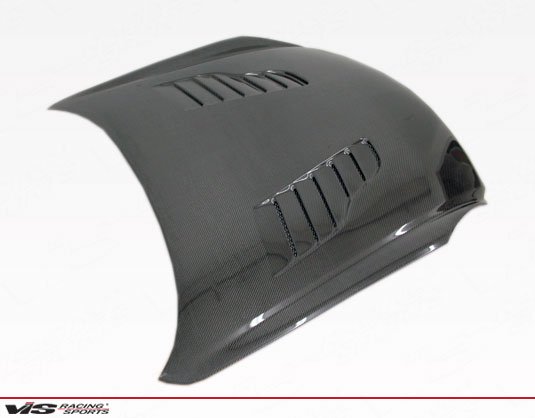 2003-2007 Infiniti G35 2Dr Z Speed Heat Extractor Carbon Fiber Hood. VIS Carbon Fiber Hoods and Trunks are made from 100% ISO-certified, Grade-A carbon fiber material. All VIS Carbon Fiber Hoods and Trunks are manufactured using a two-part construction design. The top layer is composed of carbon fiber material bonded to the hood surface with high-grade epoxy resin, andfinished with an ultra-clear (Poly Shield), UV-protective polyurethane coating for a high gloss finish. A one-piece, smooth underside shell is fused to the top layer enhancing the product’s structural integrity. The edges are smoothed by hands to insure good quality finish all around. In 2014, we further improved on this manufacturing process by introducing the Vacuum Infusion Process (V.I.P.), which utilizes a single-mold vacuum to produce parts that are 10-20% lighter than before while improving durability. We are transitioning our full spectrum of carbon parts to use the VIP process so that our customers can enjoy these improved products without incurring a huge cost increase.
All VIS Carbon Fiber Hoods and Trunks come with a VIS badge of authenticity. Please be sure to look for the badge when purchasing. Due to the unknown nature of the intended uses of these products, hood pins are required. These products are intended for off-road use only, unless your local and state laws state otherwise.